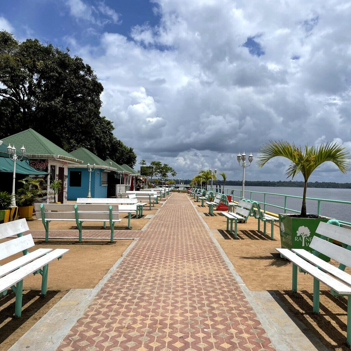 Boat navigating the mighty Essequibo River in Guyana