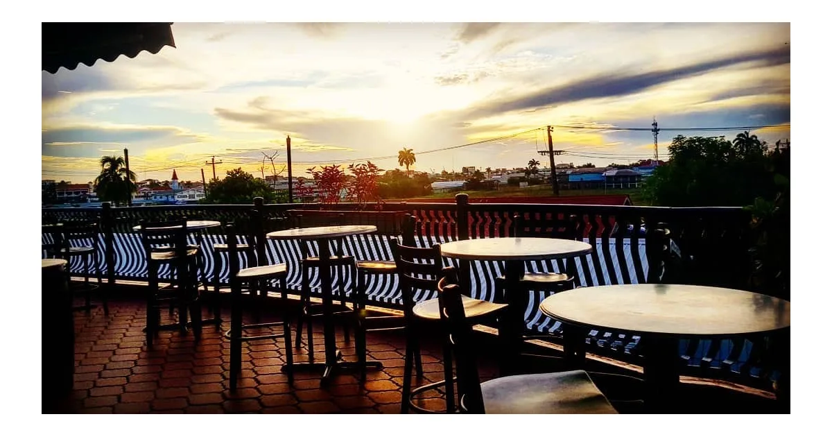 Best bars in Guyana - Altitude rooftop bar in Georgetown at sunset