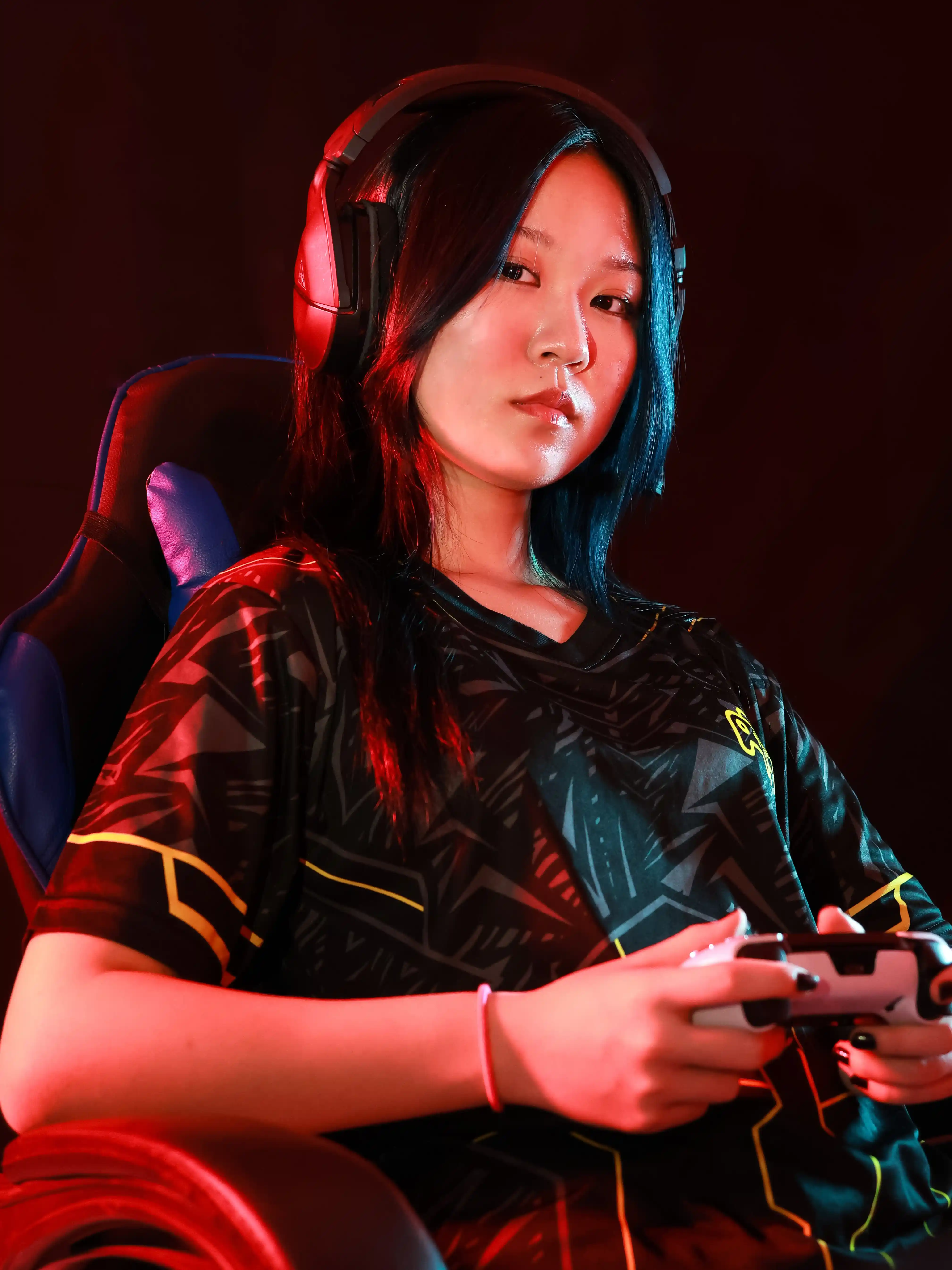 Esports player with controller — GameFest competitive gaming